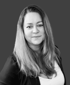 Black and white headshot of Sarah