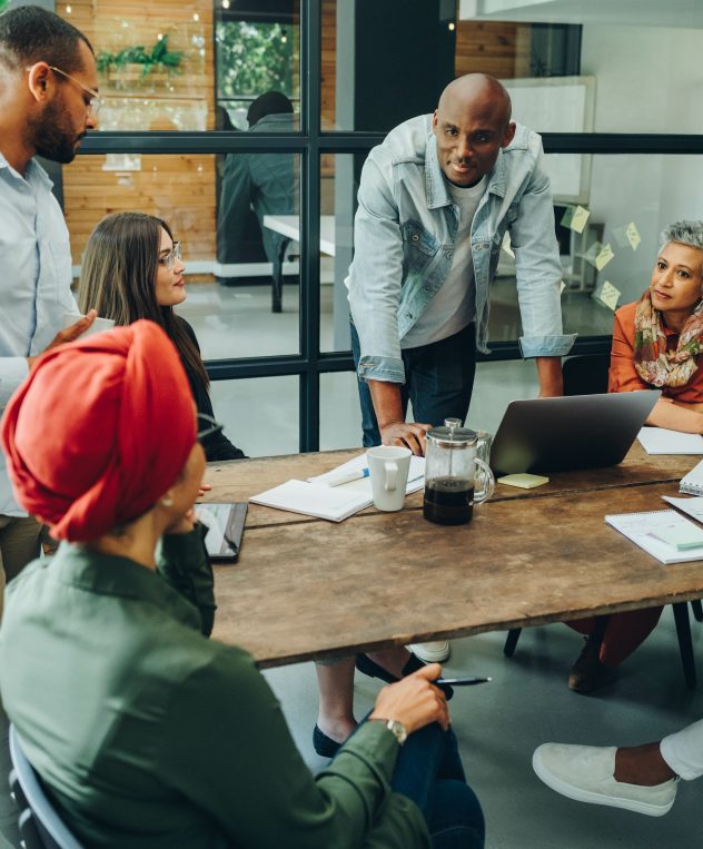 Businesspeople reviewing a carbon footprint report