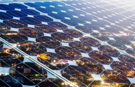 Texture of photovoltaic panels solar panel with city night light background.